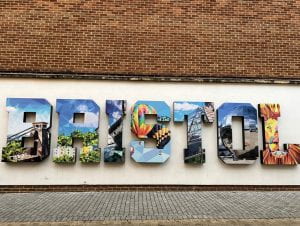 A photo of a colourful sign that reads 'Bristol',